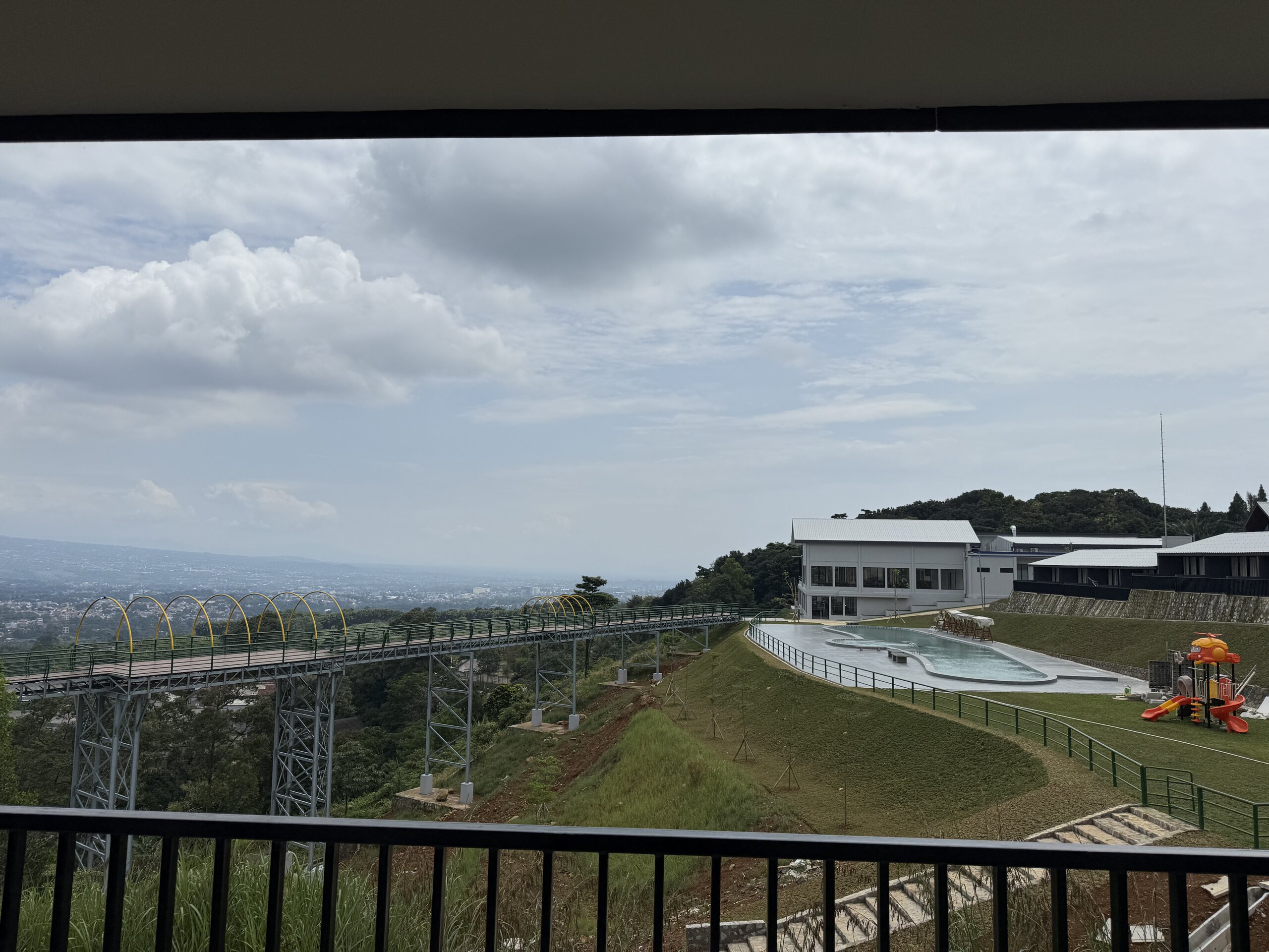 Spacious bedroom with comfortable king-size bed and modern decor