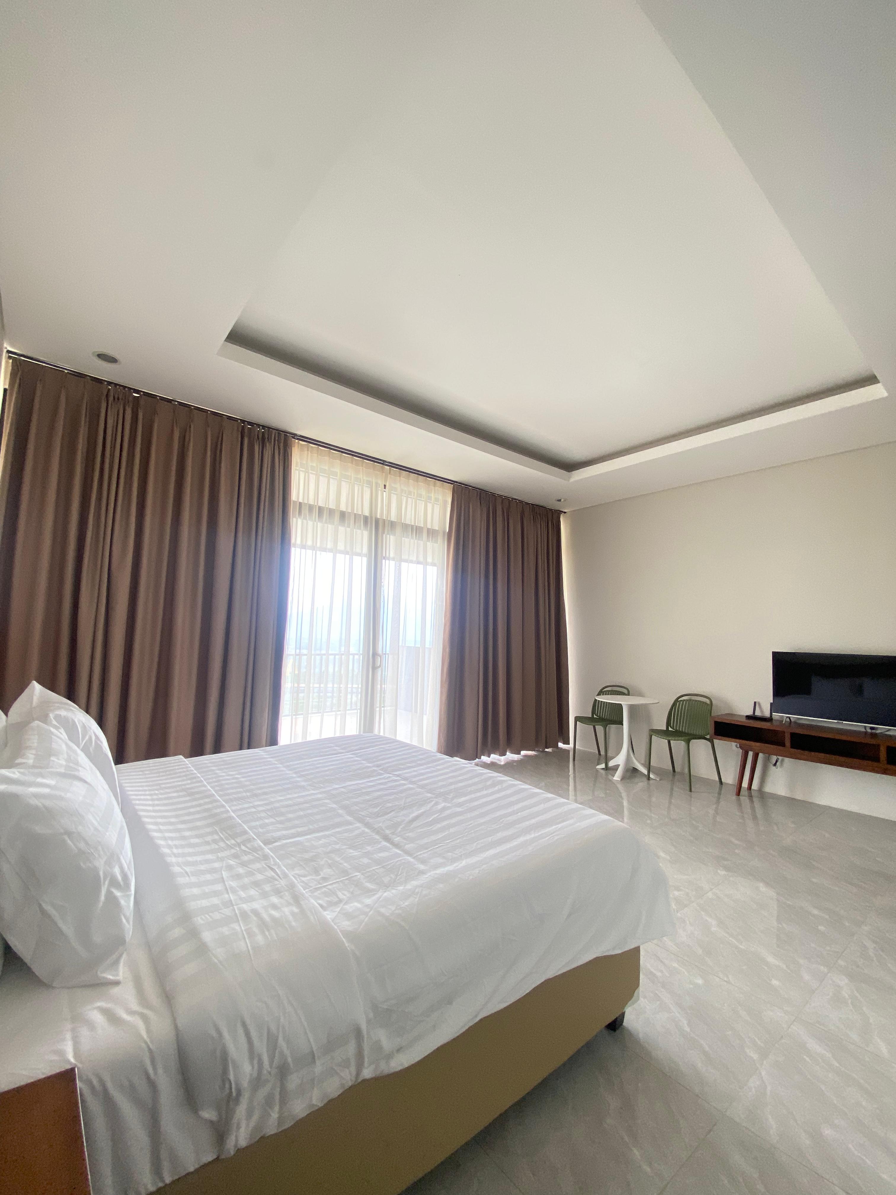 Cozy bedroom with comfortable bedding