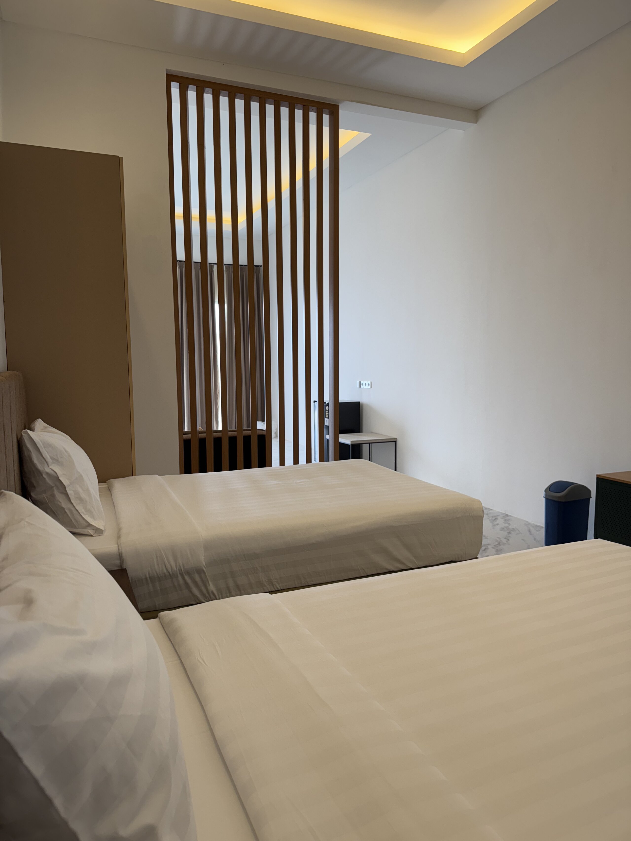 Elegant bedroom with premium furnishings and ambient lighting